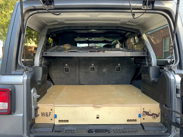 Storage system for jeep wrangler
