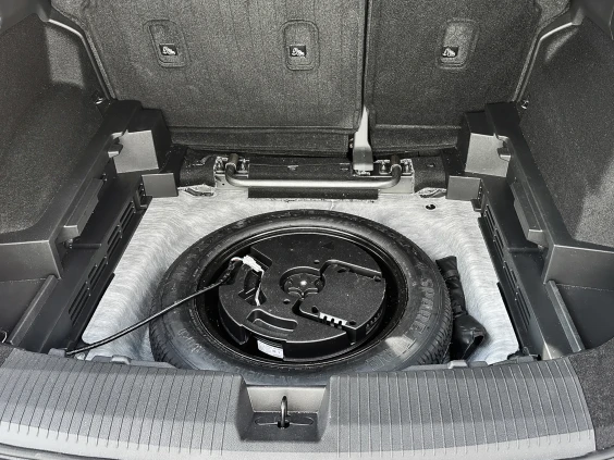 Storage in spare tire area nissan rouge